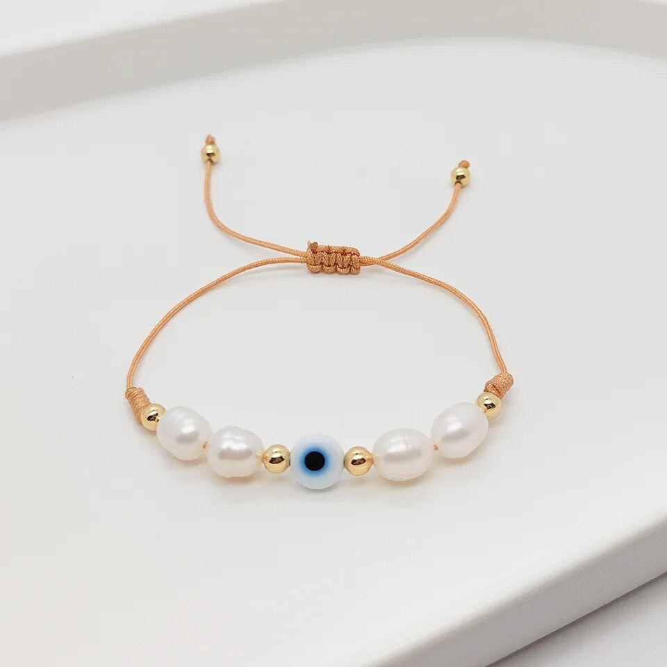 Pearl and eye bead bracelet