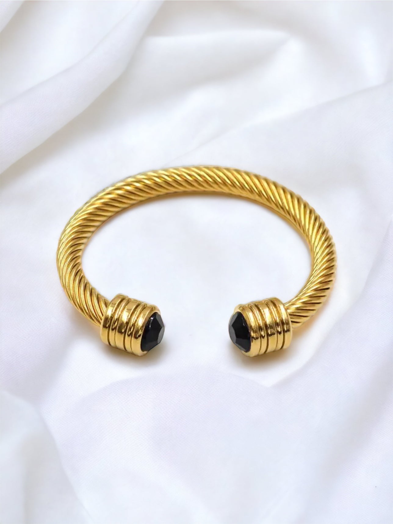 GOLD TWISTED BANGLE - BLUE STONE