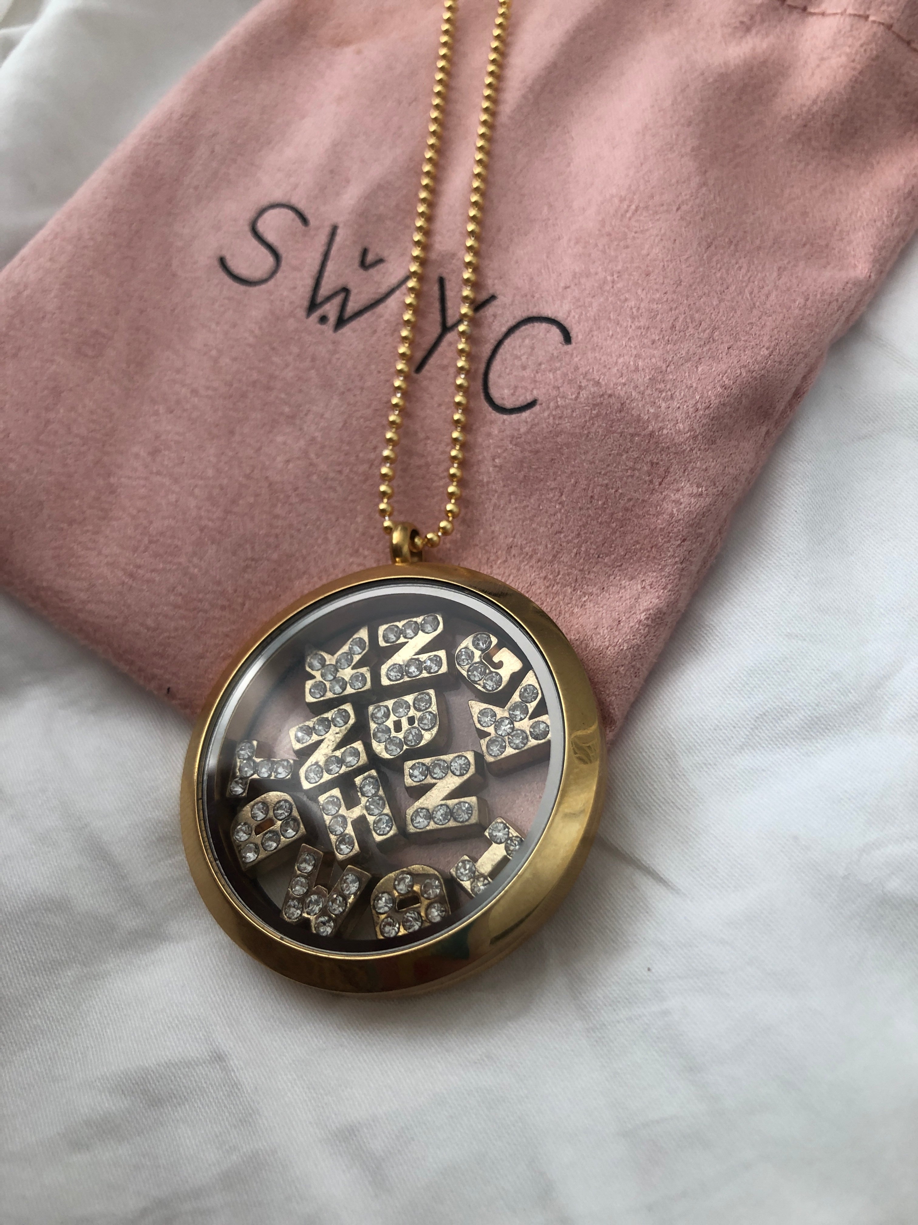 LARGE ROUND LOCKET