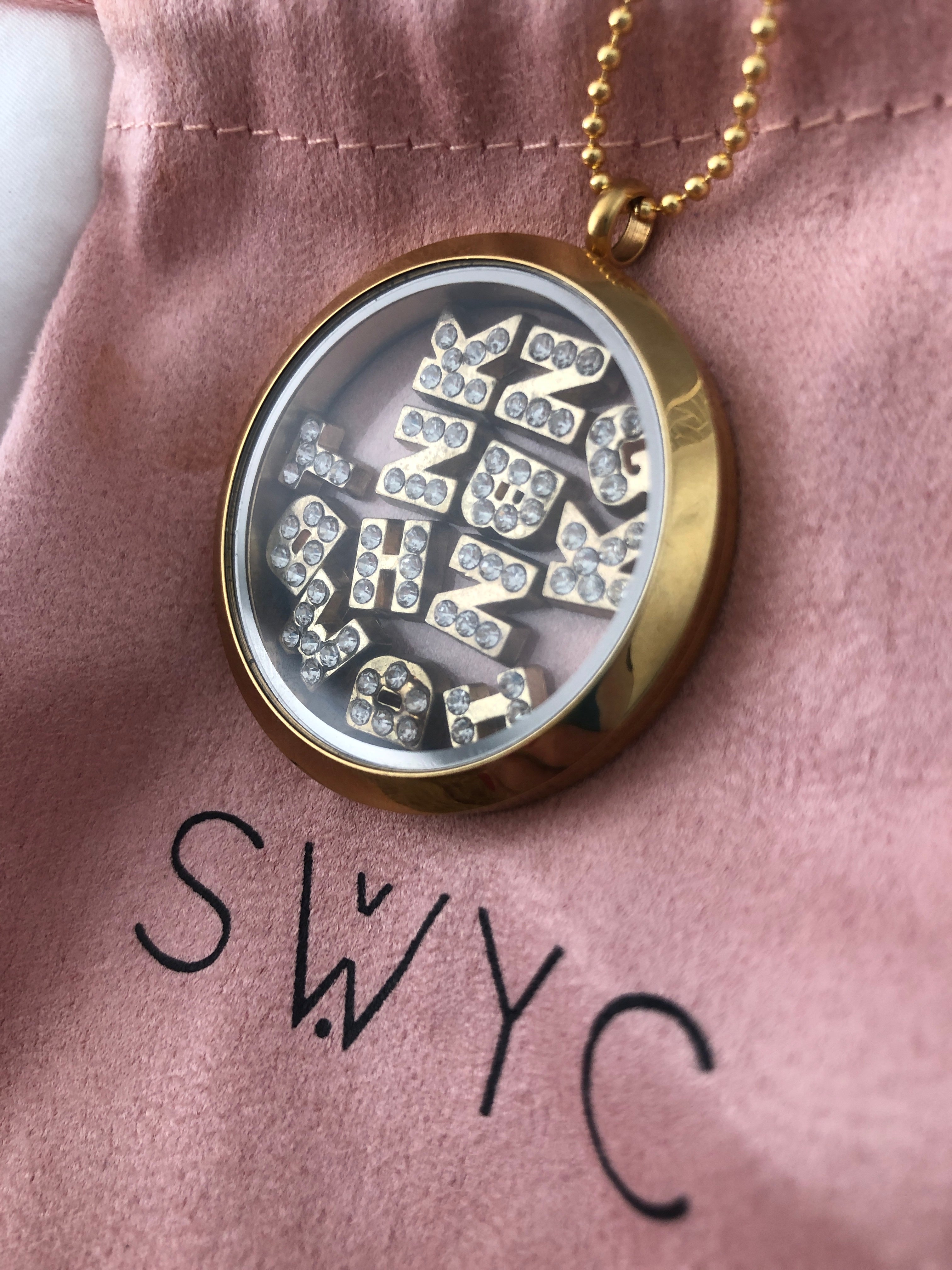 LARGE ROUND LOCKET