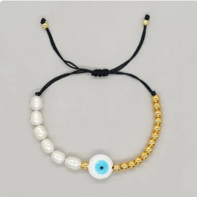 Pearl and gold bead eye bead bracelet