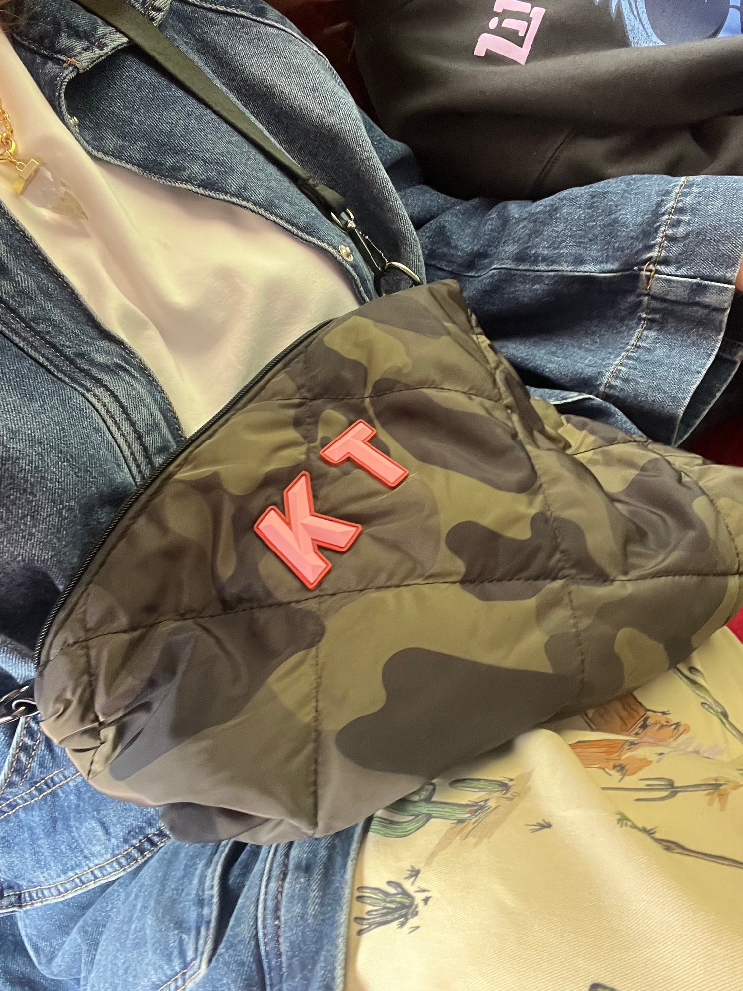 Camo print quilted messenger bag- Rubber initials