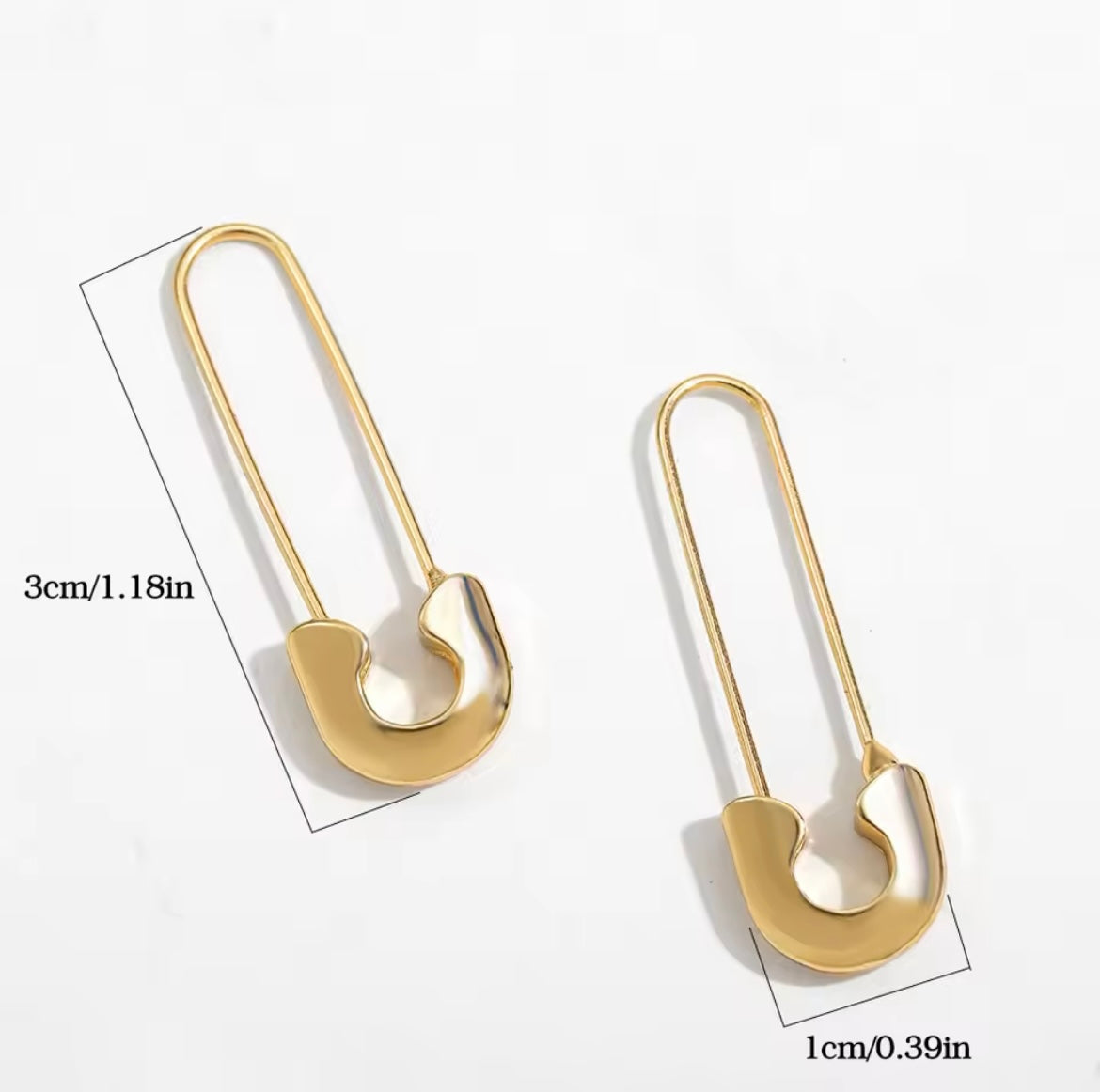 Safety pin thread through earrings