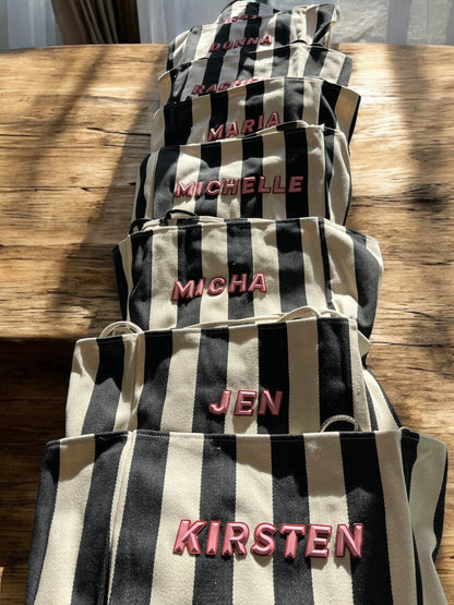 Rubber wording black striped bag