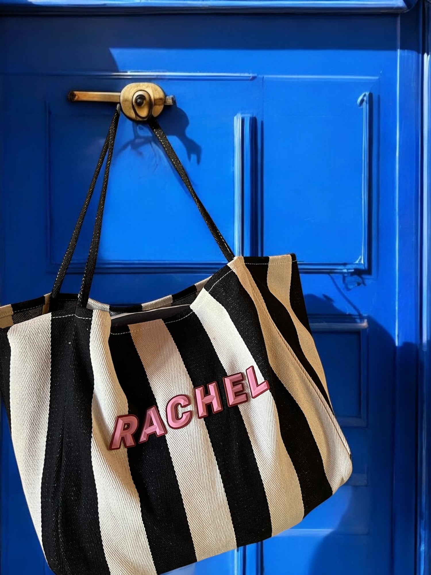 Rubber wording black striped bag