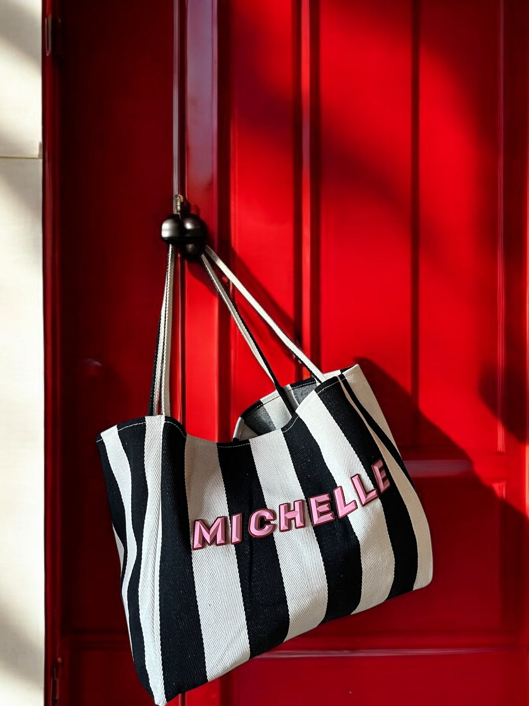 Rubber wording black striped bag