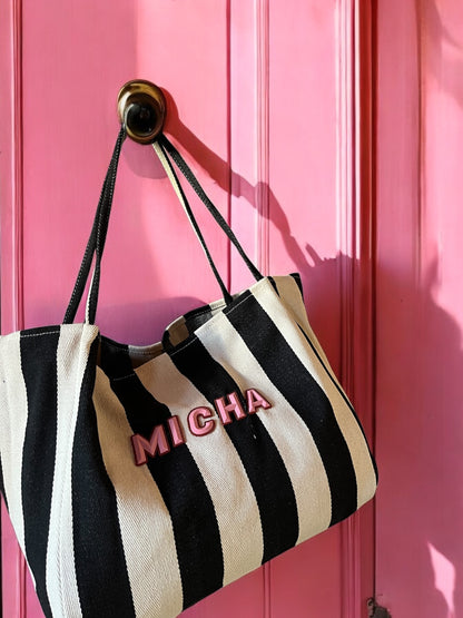 Rubber wording black striped bag