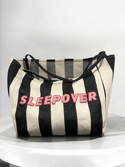 Rubber wording black striped bag