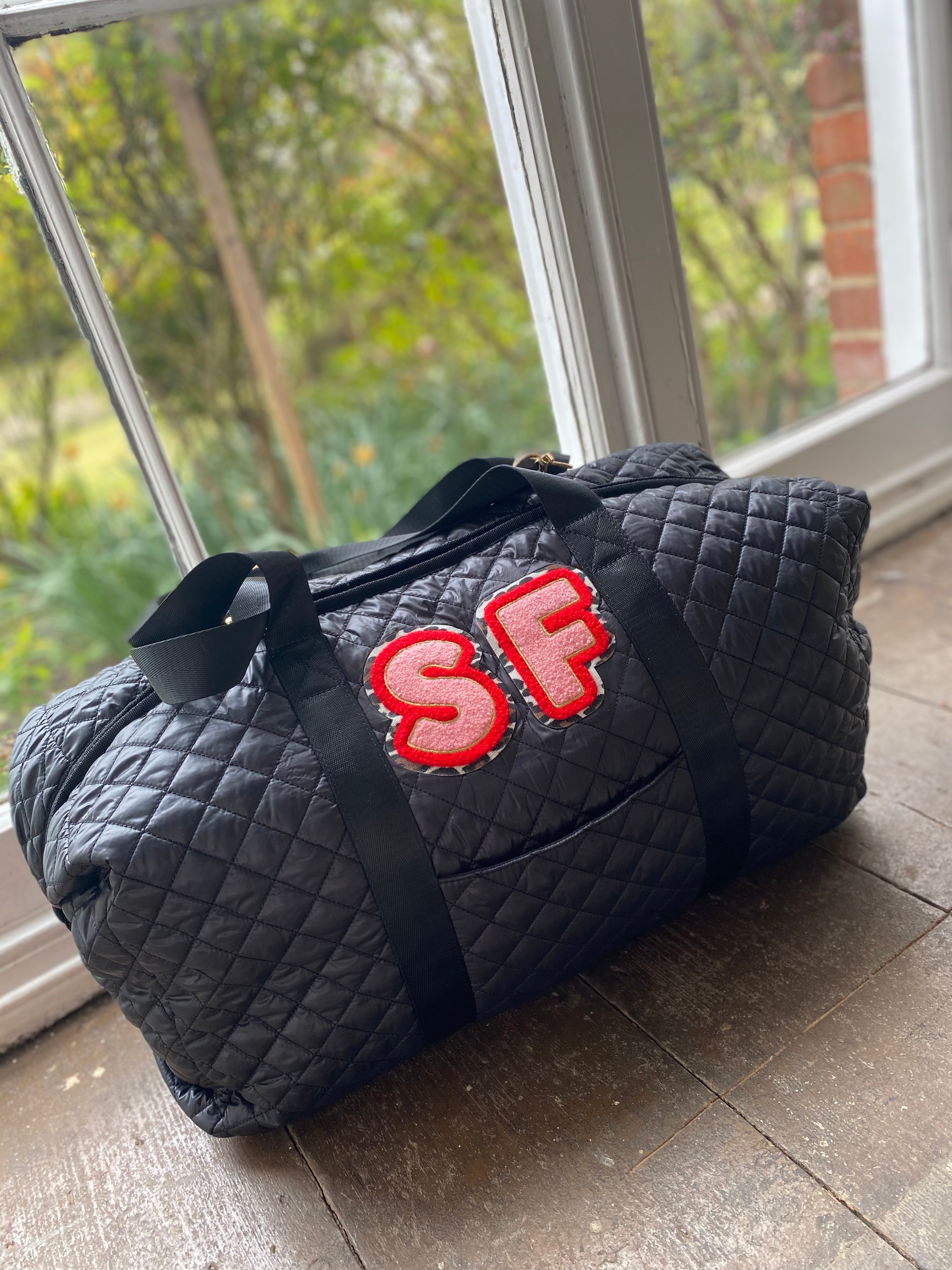 Black puffy holdall