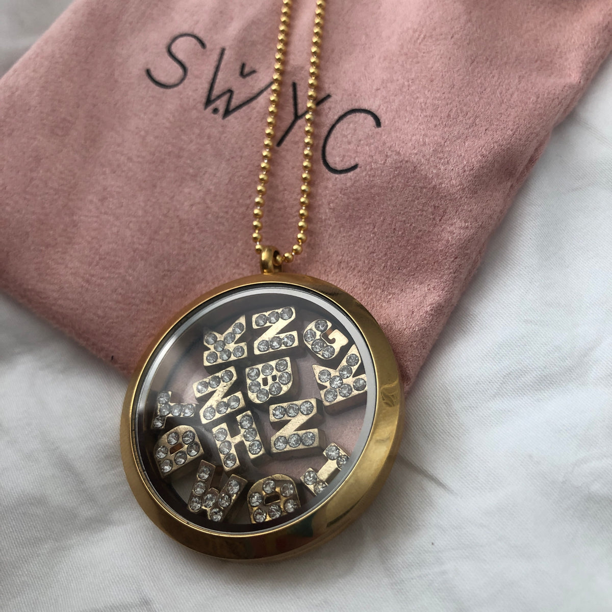 LARGE ROUND LOCKET – SWYC