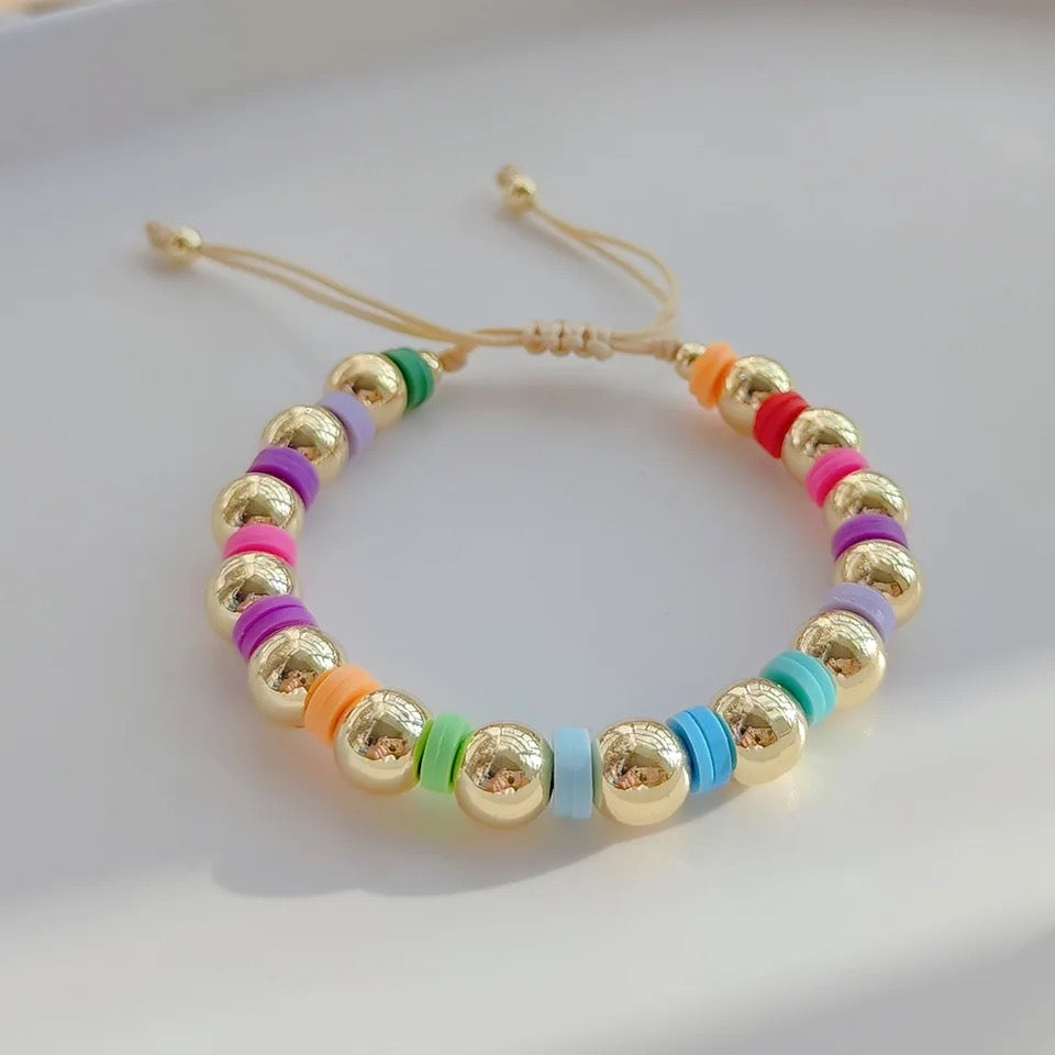 Heavy gold bead rainbow bracelet