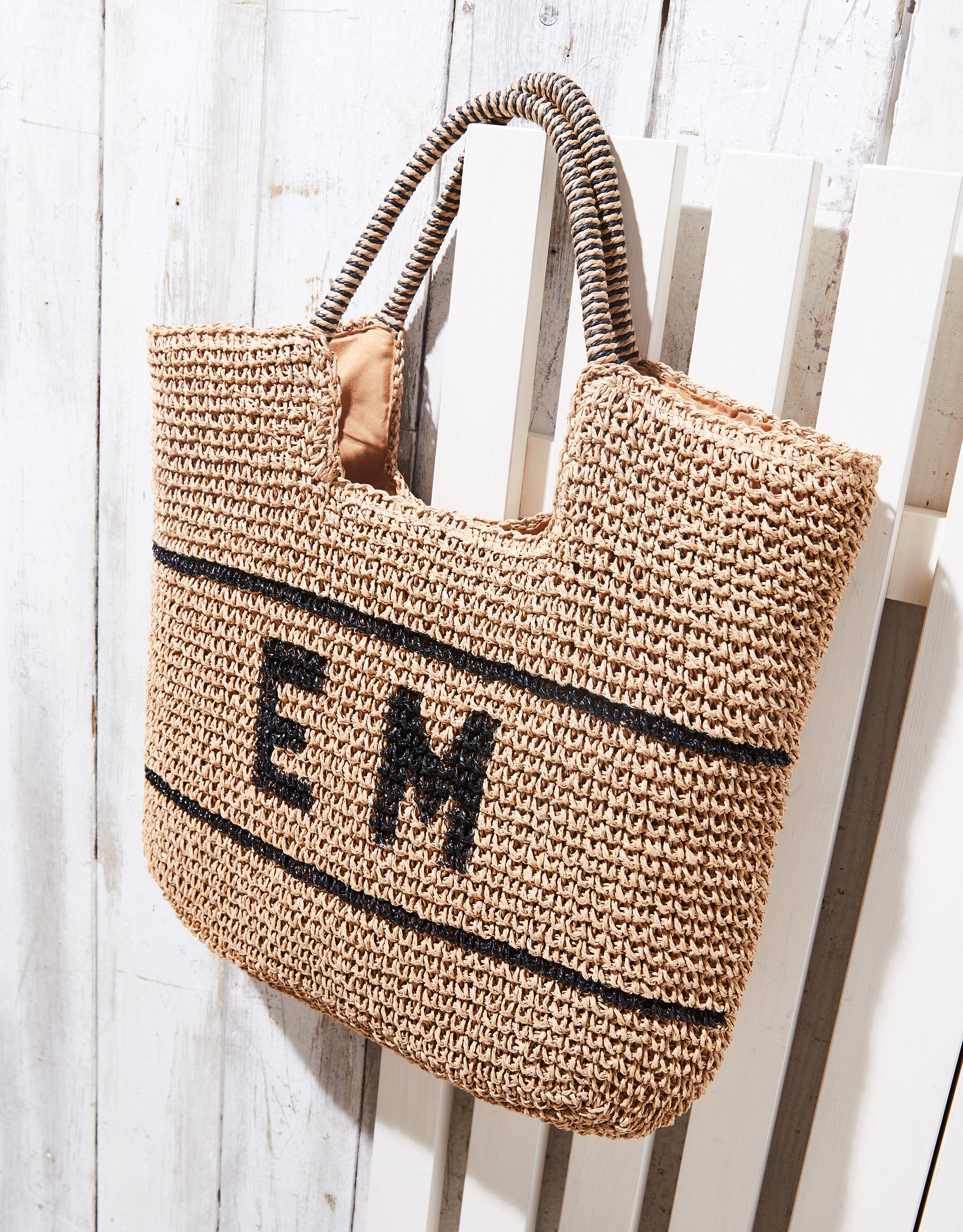 Initial straw bag sale